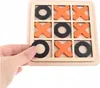 A hand is placing a black 'O' piece onto a wooden tic-tac-toe board. Náhled obrázku produktu
