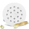 A white pasta maker attachment with a bunch of spaghetti next to it. Voir les images du produit