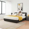 A couple is relaxing on a bed in a bedroom. Produktbild-Vorschau