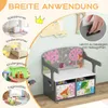 A marketing image showcasing a children's bench with storage, highlighting its versatility in different play and learning environments. Produktbild-Vorschau