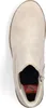 A top-down view of a beige boot on a white background. Voir les images du produit