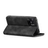A black flip cover phone case for a Xiaomi Redmi 10C is shown from a side angle, propped open. Produktbild-Vorschau