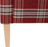 A close-up view of the bottom corner of a red plaid sofa, showing one of its wooden legs. Produktbild-Vorschau