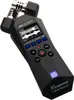 A black Zoom H1essential Handy Recorder is shown against a white background. Produktbild-Vorschau