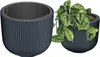 Two dark gray planters are shown. One is empty and the other contains a green plant. Náhled obrázku produktu