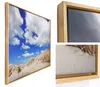 A collage of images showing a framed canvas print of a beach scene, with close-ups of the frame and canvas texture. Produktbild-Vorschau