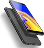 A black TPU phone case with a red trim is shown diagonally on a white background. The phone inside the case is partially visible, displaying a colorful wallpaper. Produktbild-Vorschau