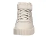 A front view of a beige Puma sneaker. Produktbild-Vorschau