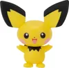 A front-facing studio shot of a small yellow toy figure with large ears and pink cheeks. Anteprima dell’immagine prodotto