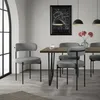 A dining room setting with chairs around a table. Náhled obrázku produktu