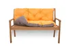 A wooden bench with an orange and gray cushion on a white background. Produktbild-Vorschau