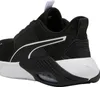A close-up side view of a black and white Puma athletic shoe. Produktbild-Vorschau