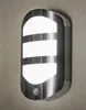 A wall-mounted outdoor light fixture with a motion sensor. Podgląd zdjęcia produktu