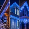 Collage of three images showing blue icicle lights decorating the eaves of houses in snowy environments. Produktbild-Vorschau