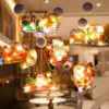 Sammlung beleuchteter Weihnachtsfensterlichter mit dem Weihnachtsmann im Schlitten, Flugzeug, Zug, beim Skifahren und mit einem Sack, mit einem Banner 'Merry Christmas' Productafbeelding-voorbeeld