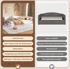 This image is a collage showing a sectional sofa bed with LED lighting and a separate image of a gray daybed frame. Text overlays highlight features of the sofa bed, some in German and some in English. Produktbild-Vorschau