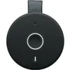 A close-up, top-down view of a black portable speaker. Produktbild-Vorschau