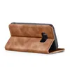 A brown flip cover case for a smartphone, shown from the side with the cover open. Produktbild-Vorschau
