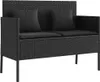 A black poly rattan garden bench with black cushions and pillows, shown from the front. Náhled obrázku produktu