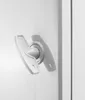 A close-up of a white electrical enclosure handle. Anteprima dell’immagine prodotto