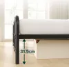 A close-up view of the side of a black metal bed frame with a white mattress, showing the clearance underneath. Produktbild-Vorschau