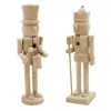 Two unpainted wooden nutcrackers against a white background. Produktbild-Vorschau