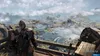 A character stands on a wooden platform overlooking a vast, misty landscape with scattered settlements and bodies of water. Náhľad obrázku produktu