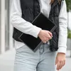 A person holding a portable monitor. Anteprima dell’immagine prodotto