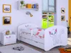 A child's bedroom with a bed, nightstand, and decorations. Produktbild-Vorschau