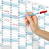 A hand is writing on a calendar with a marker. Anteprima dell’immagine prodotto