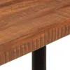 A close-up view of the edge and surface of a wooden table. Podgląd zdjęcia produktu