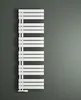 A white radiator is mounted on a gray wall. Produktbild-Vorschau