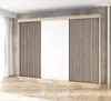 A modern wardrobe with sliding doors and slatted panels.