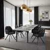 A dining room setting with a table and chairs. Produktbild-Vorschau