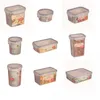 A collage of various sizes and shapes of clear plastic food storage containers with blue lids. Produktbild-Vorschau