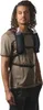 A man wearing a running vest with water bottles. Produktbild-Vorschau