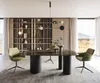 A modern dining room with a large table and chairs, set against a backdrop of a bookshelf and a large window with a scenic view. Produktbild-Vorschau