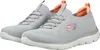 A pair of gray Skechers sneakers with pink and orange accents, shown from a slightly elevated side angle against a white background. Produktbild-Vorschau