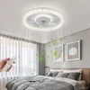 A modern bedroom with a ceiling fan light and a bed. Produktbild-Vorschau