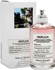 A bottle of Maison Margiela Replica Spring In A Park Eau de Toilette and its packaging are shown against a white background. Produktbild-Vorschau