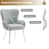 A gray upholstered chair with chrome legs, illustrating ergonomic design features with text labels and a diagram of a human spine. Podgląd zdjęcia produktu