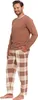 A man is posing in pajamas against a white background. Produktbild-Vorschau