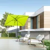 A modern patio with two chairs and a bright green umbrella in front of a contemporary house. Produktbild-Vorschau
