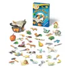 A collection of small, colorful game pieces and a game box are arranged on a white background. Anteprima dell’immagine prodotto