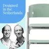A marketing image featuring two men and a green high chair. Podgląd zdjęcia produktu