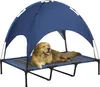 A golden retriever dog is lying on a raised pet bed with a blue canopy. Produktbild-Vorschau