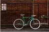 MuchoWow® Poster Grünes Fahrrad vor dem Tor 180x120 cm - Produktbild-Vorschau 1