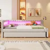A modern daybed with LED lighting in a bedroom setting. Produktbild-Vorschau