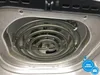 A close-up view of the heating element and fan inside an air fryer. Produktbild-Vorschau