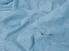 A close-up view of a light blue terry cloth sheet. Náhľad obrázku produktu